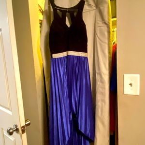Royal blue and black dress. No stains or any issues. Brand - crystal doll size 5